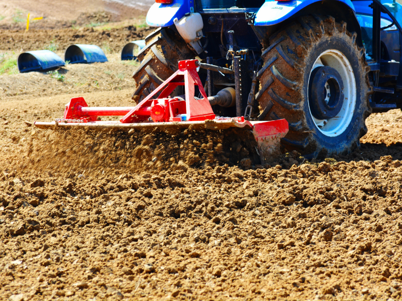 tillage in dirt with tractor